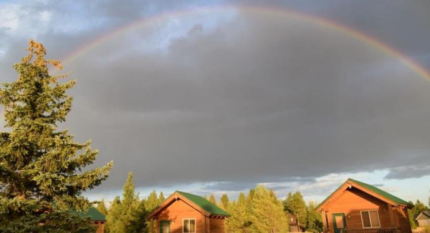 Rainbow over River Lodge's Private Cabins